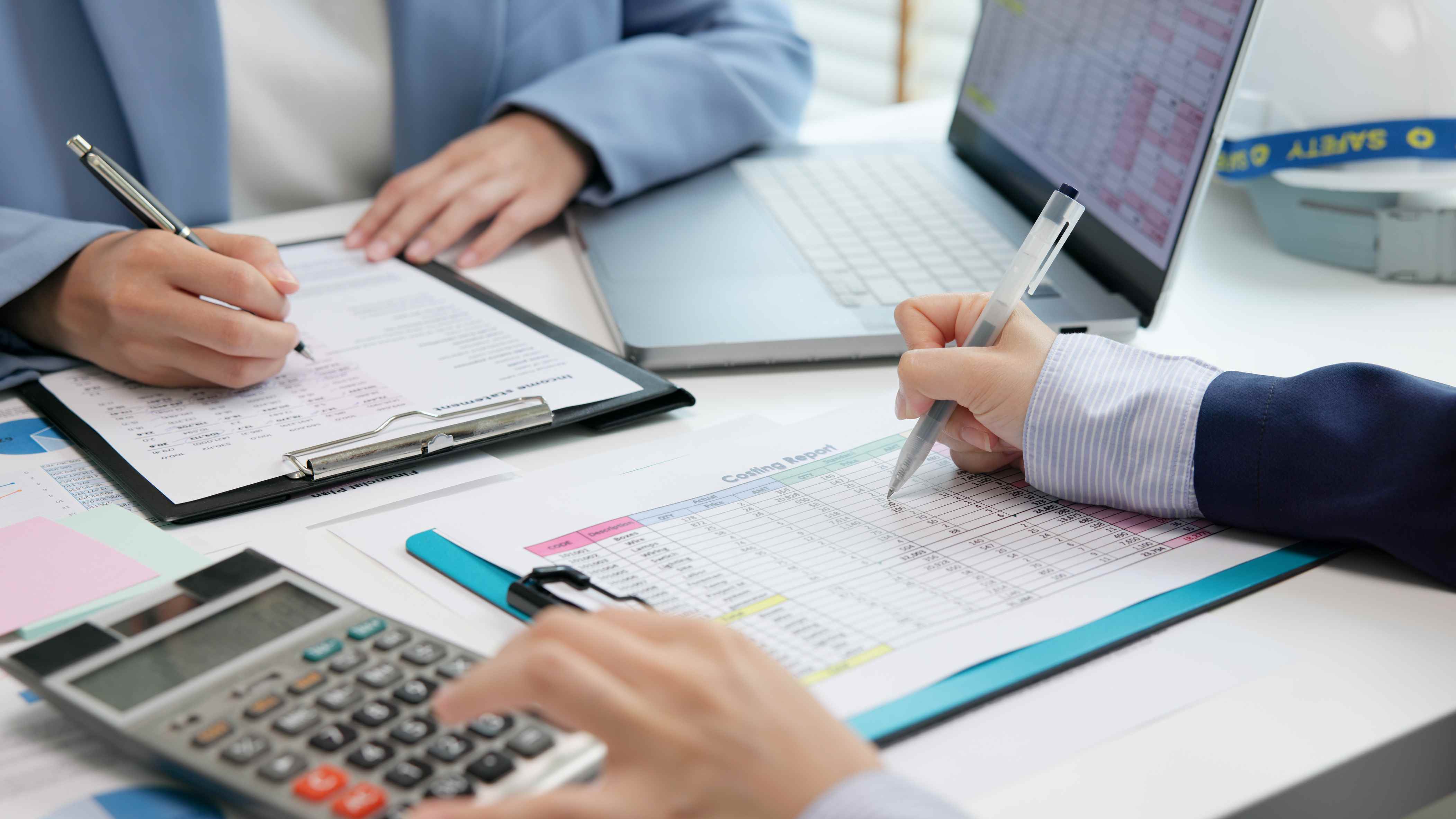 CPA firm accountants reviewing financial spreadsheets