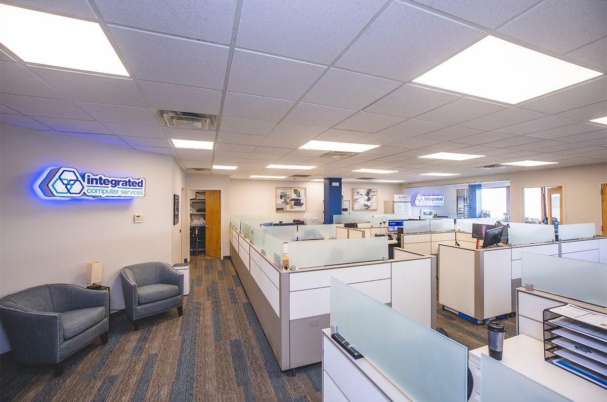 ICS open office workspace with cubicles and lounge seating