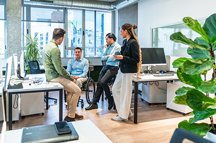 Company team considering managed IT services vs. outsourcing.