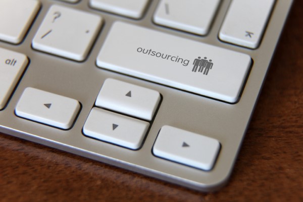 benefits of outsourcing security services button on macbook