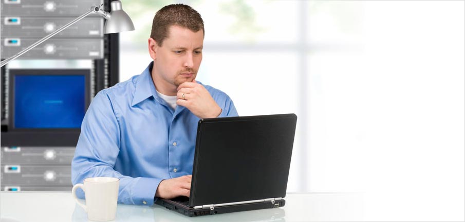 Site admin working on laptop